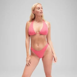 Bas de bikini FLU3NTE échancré en tissu éponge rose