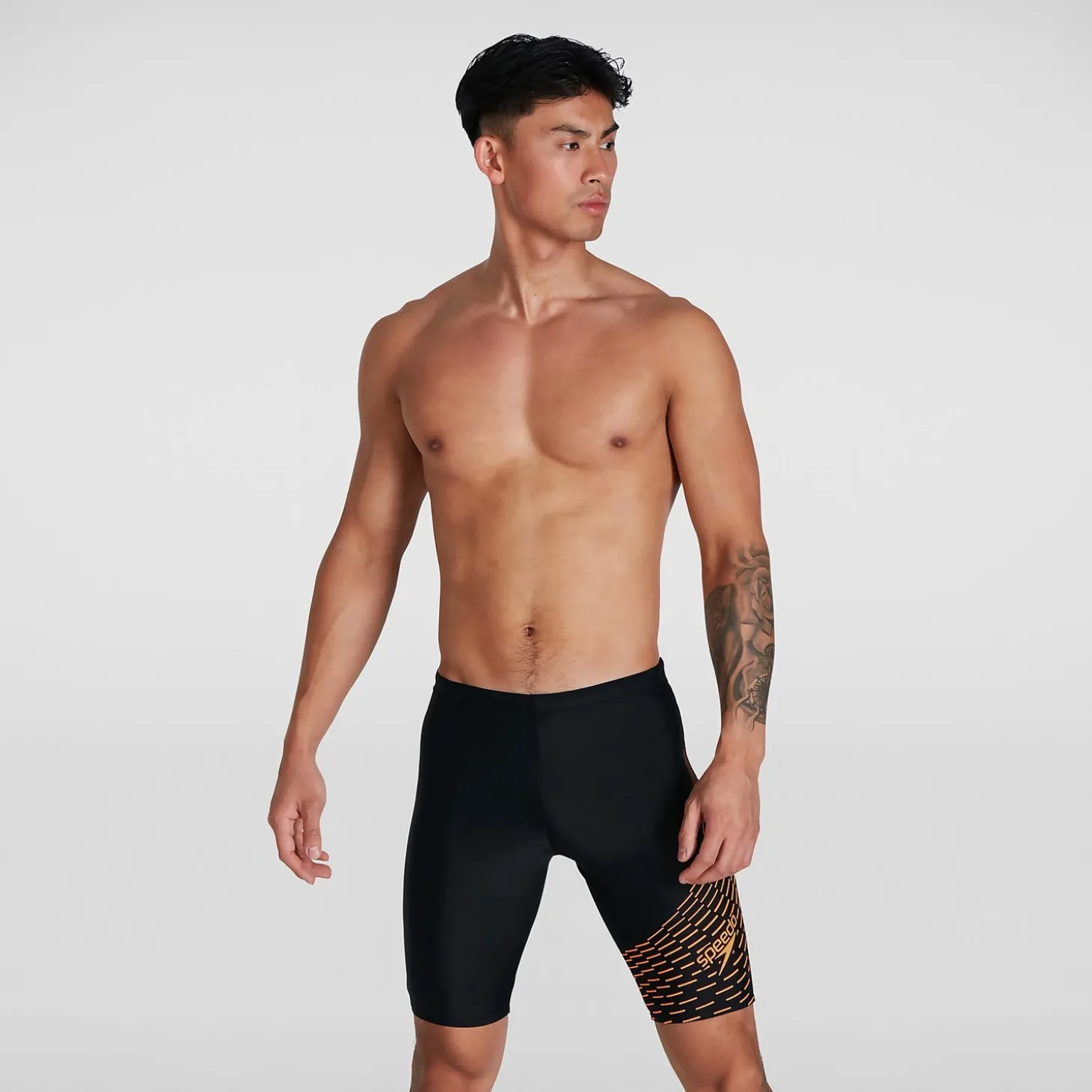 Boxer de bain Homme Allover coupe en V noir/orange