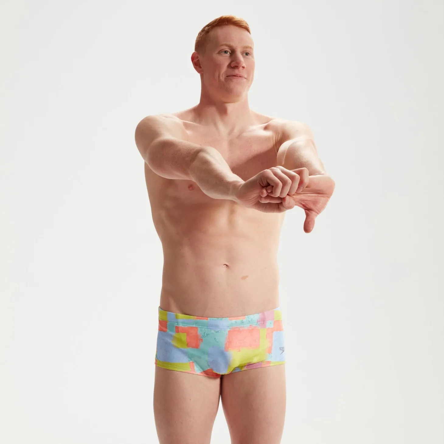 Slip de bain Club Training homme 17 cm Allover Digital Corail/vert/bleu