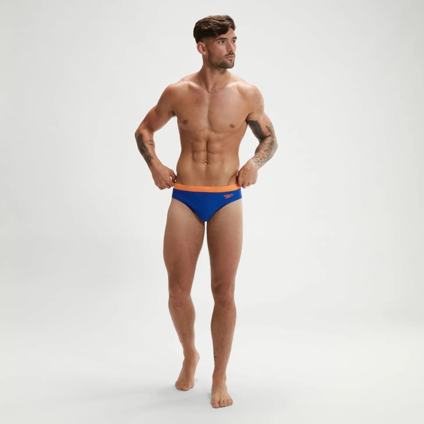 Slip de bain Homme Logo 7 cm bleu/orange