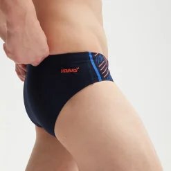 Slip de bain Homme Tech Panel 7 cm bleu/orange